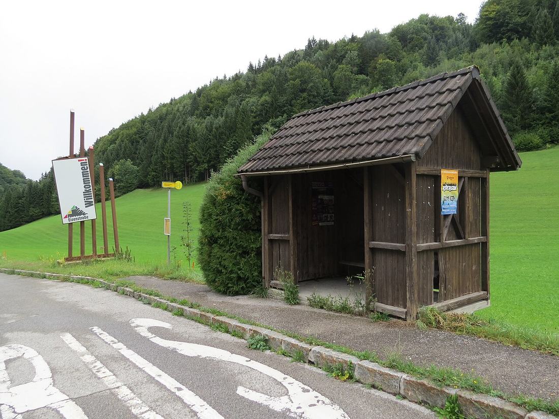 An empty bus stop shelter